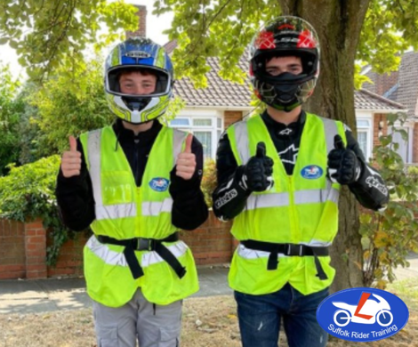 Two Students with Thumbs Up